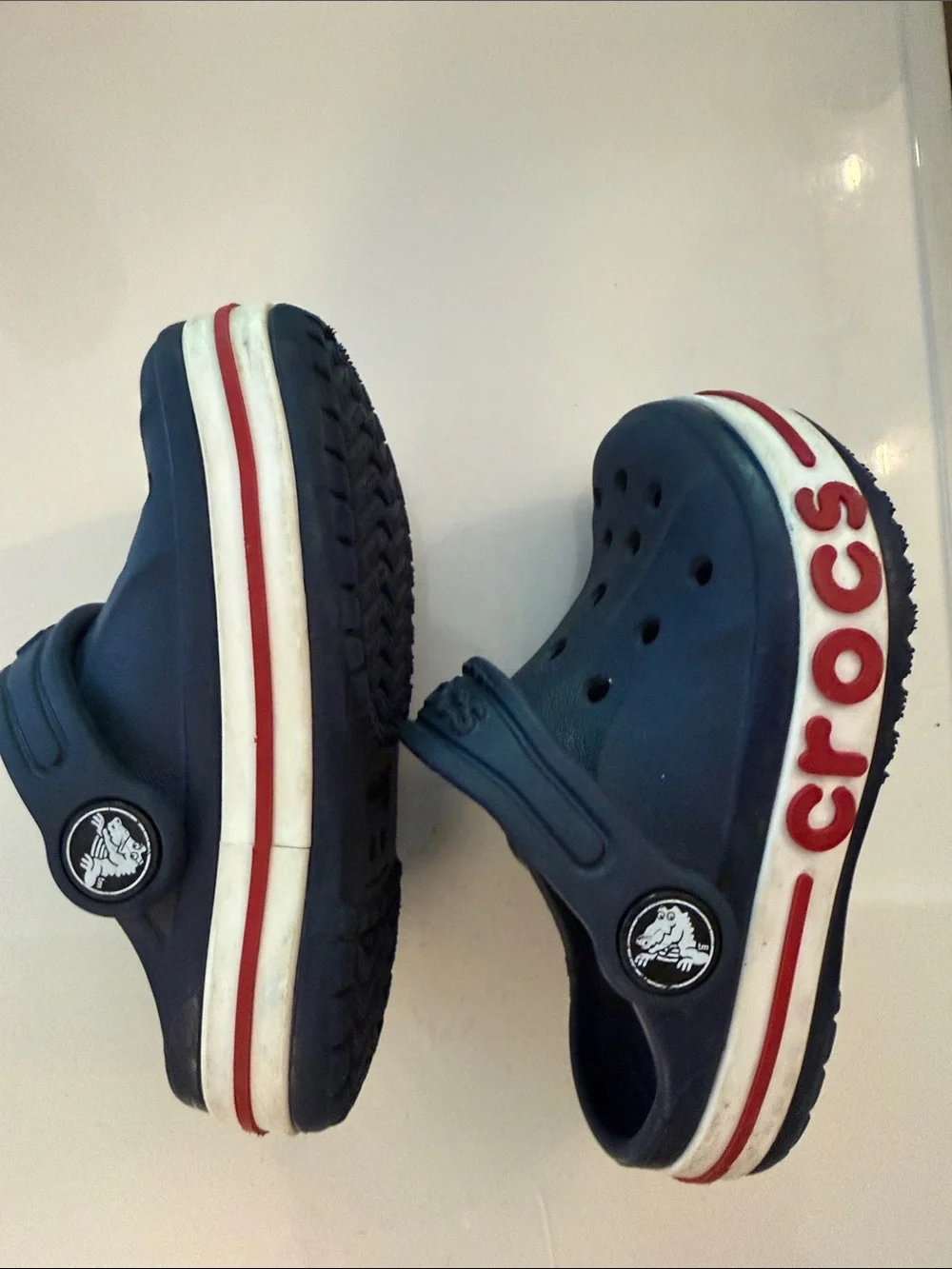 CROCS toddler Navy Blue Clogs with Red & White Trim